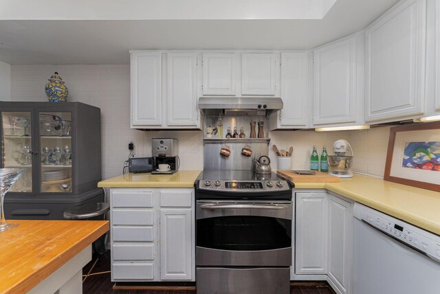 91 Glen Dr, Worthington, OH 43085 - kitchen with white dishwasher, light countertops, electric range, white cabinets, and under cabinet range hood