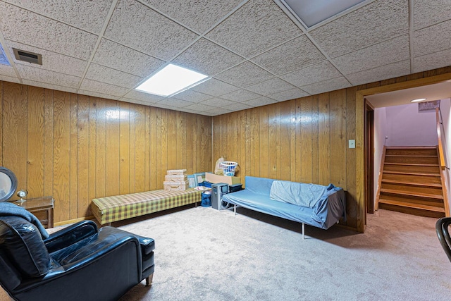91 Glen Dr, Worthington, OH 43085 - carpeted living area with stairway and wooden walls