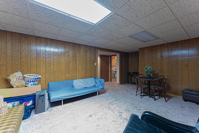 91 Glen Dr, Worthington, OH 43085 - living area featuring wooden walls and carpet flooring