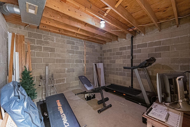 91 Glen Dr, Worthington, OH 43085 - workout room featuring concrete block wall and visible vents