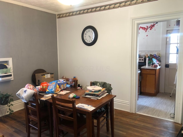 dining room with wood finished floors
