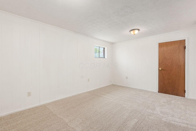 6350 Roselawn Ave, Reynoldsburg, OH 43068 - empty room featuring carpet floors and a textured ceiling