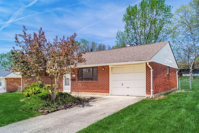 6350 Roselawn Ave, Reynoldsburg, OH 43068 - ranch-style house with driveway, an attached garage, fence, a front yard, and brick siding