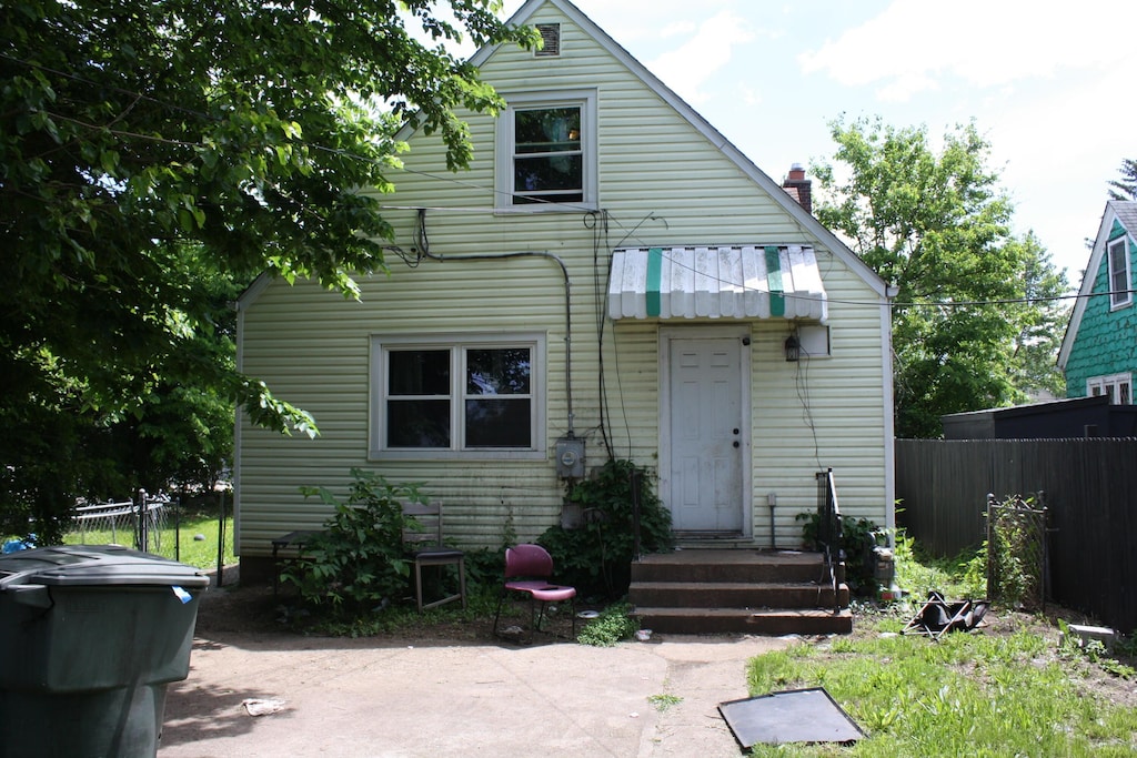 929 Bulen Ave, Columbus, OH 43206 - rear view of property featuring a chimney