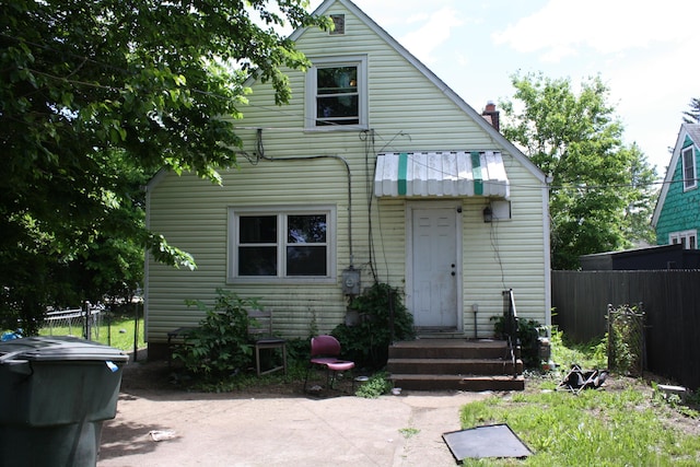 929 Bulen Ave, Columbus, OH 43206 - rear view of property featuring a chimney