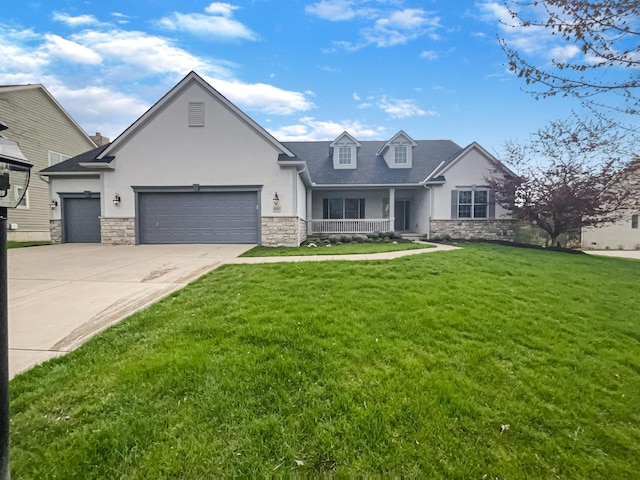 view of front facade with an attached garage, a porch, stone siding, and driveway