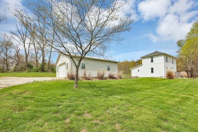 exterior space with a garage and driveway