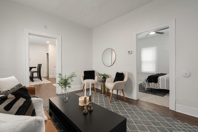 238 E Barthman Ave, Columbus, OH 43207 - living room with baseboards, ceiling fan, and dark wood-style floors