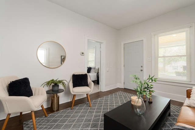 238 E Barthman Ave, Columbus, OH 43207 - living area featuring dark wood-type flooring and baseboards