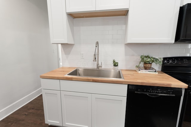 238 E Barthman Ave, Columbus, OH 43207 - kitchen with baseboards, wooden counters, a sink, and black appliances