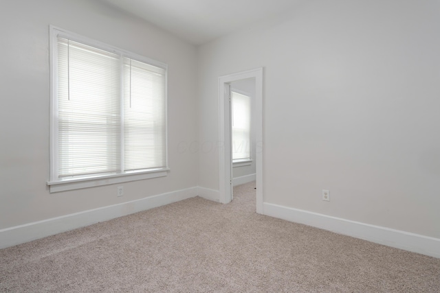 238 E Barthman Ave, Columbus, OH 43207 - unfurnished room with light colored carpet and baseboards