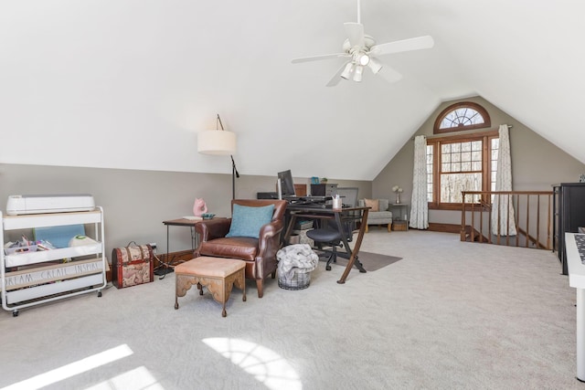 office area featuring ceiling fan, vaulted ceiling, and carpet flooring