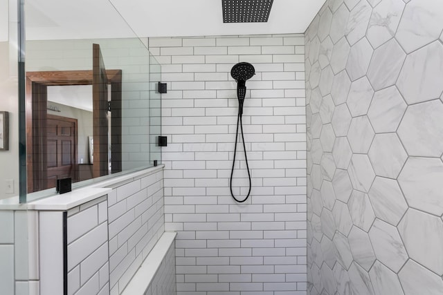 full bathroom with a tile shower