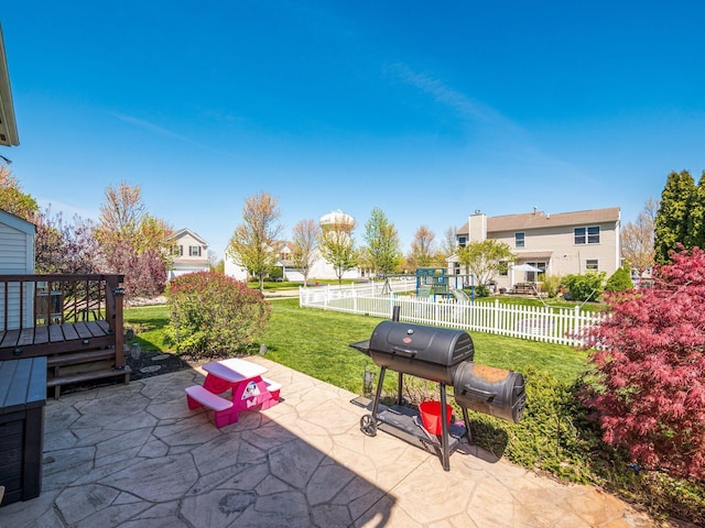 view of patio featuring fence