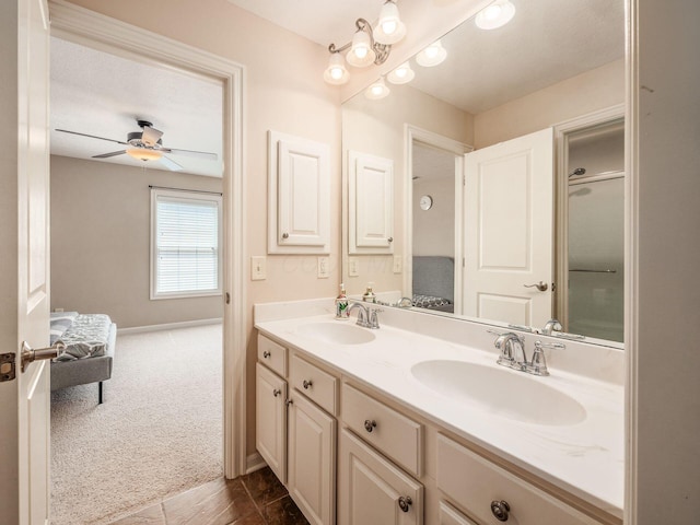 7766 Dickens Ct, Delaware, OH 43015 - bathroom with double vanity, baseboards, and a sink
