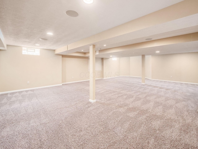7766 Dickens Ct, Delaware, OH 43015 - basement featuring baseboards, carpet floors, and recessed lighting
