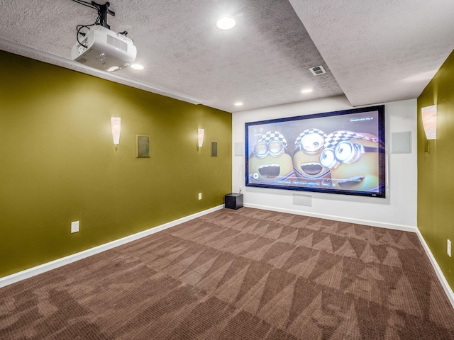 7766 Dickens Ct, Delaware, OH 43015 - carpeted cinema room featuring baseboards, a textured ceiling, visible vents, and recessed lighting