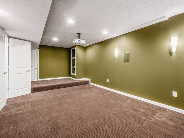 7766 Dickens Ct, Delaware, OH 43015 - finished below grade area with recessed lighting, baseboards, a textured ceiling, and carpet