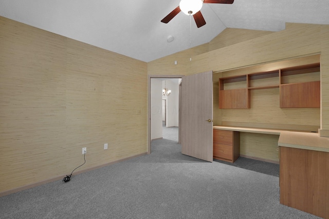 5585 Meadowood Ln, Westerville, OH 43082 - interior space featuring built in desk, lofted ceiling, carpet, and ceiling fan with notable chandelier