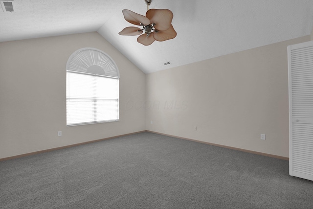 5585 Meadowood Ln, Westerville, OH 43082 - empty room featuring a ceiling fan, visible vents, carpet, and vaulted ceiling