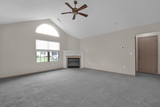 5585 Meadowood Ln, Westerville, OH 43082 - unfurnished living room featuring a ceiling fan, baseboards, carpet flooring, visible vents, and a tile fireplace