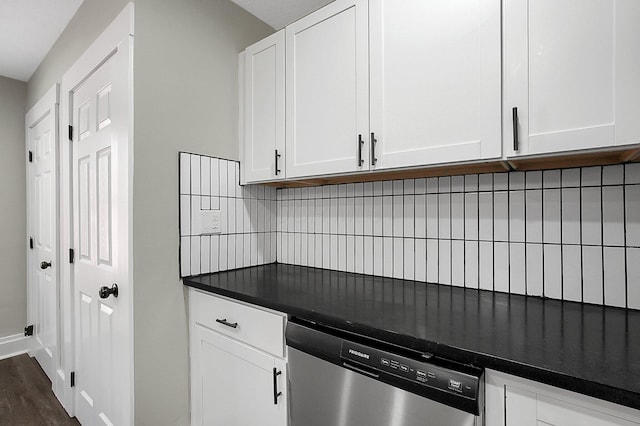 kitchen with white cabinets, dark countertops, dishwasher, and dark wood-style floors