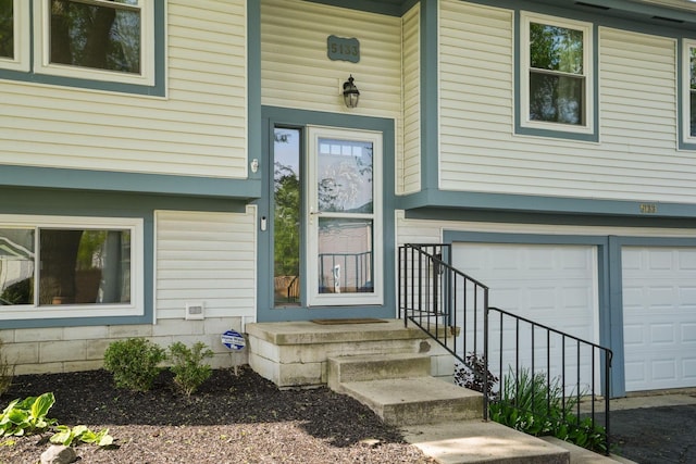 5133 Hidden View Dr, Hilliard, OH 43026 - doorway to property featuring an attached garage