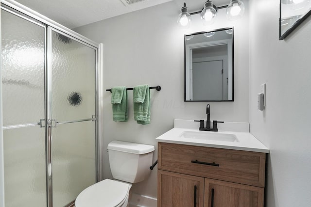 5133 Hidden View Dr, Hilliard, OH 43026 - bathroom featuring a shower stall, vanity, and toilet