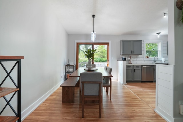 5133 Hidden View Dr, Hilliard, OH 43026 - dining room featuring light wood-style flooring and baseboards