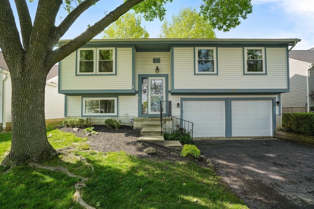 5133 Hidden View Dr, Hilliard, OH 43026 - bi-level home with a garage and driveway