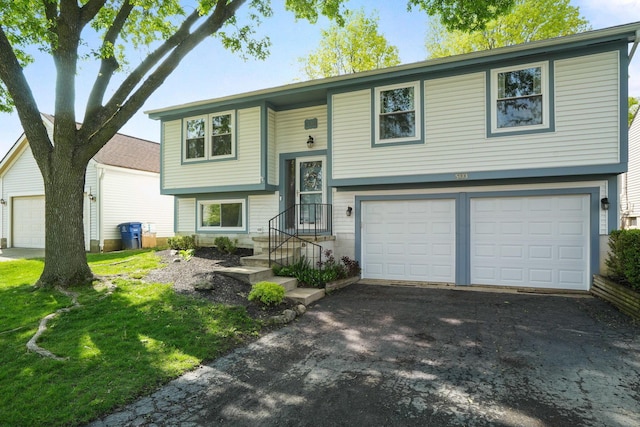 5133 Hidden View Dr, Hilliard, OH 43026 - raised ranch with driveway and a garage