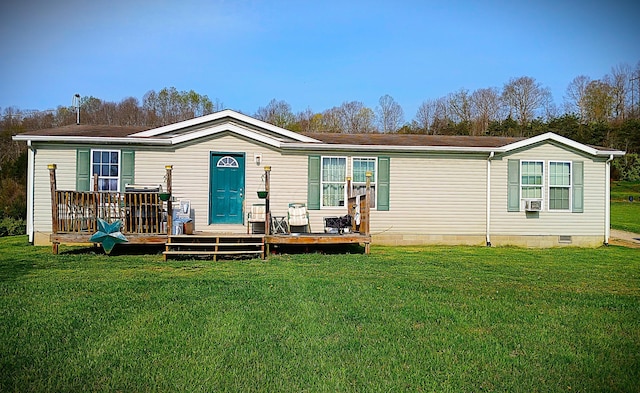 rear view of property with crawl space, a yard, cooling unit, and a deck