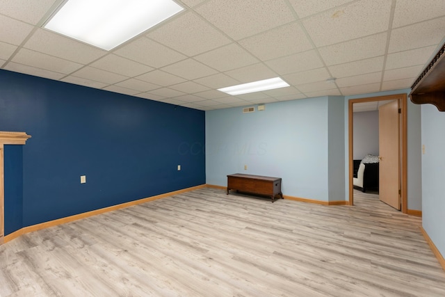 5796 Thada Ln, Columbus, OH 43229 - finished below grade area featuring wood finished floors, baseboards, and a paneled ceiling
