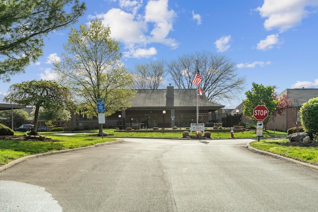 5796 Thada Ln, Columbus, OH 43229 - view of road with curbs and traffic signs