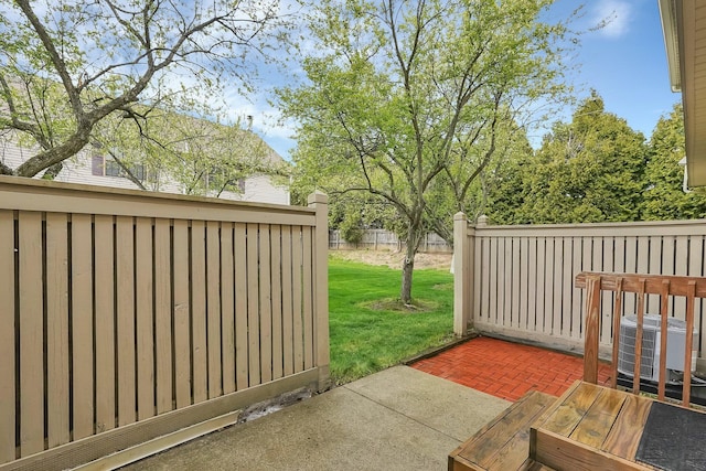 view of patio / terrace featuring central AC and fence