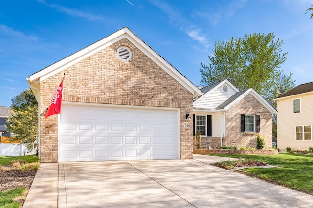 ranch-style house featuring brick siding, an attached garage, driveway, and a front lawn