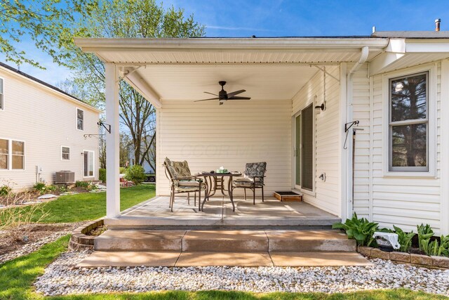 view of patio featuring central air condition unit and ceiling fan