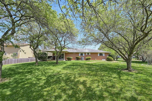 view of yard with fence