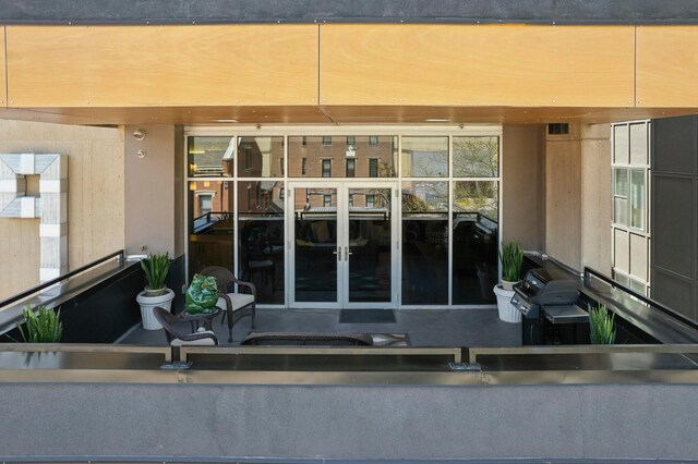 entrance to property featuring french doors