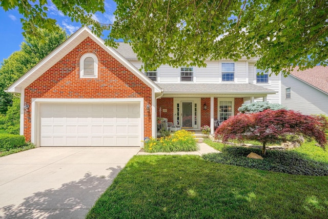 7317 Crosett Ct, Canal Winchester, OH 43110 - traditional home with brick siding, a garage, concrete driveway, a front lawn, and a shingled roof