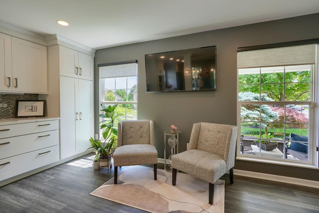 sitting room with recessed lighting, wood finished floors, and baseboards
