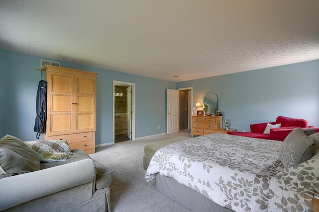 bedroom with a textured ceiling, visible vents, baseboards, and light carpet