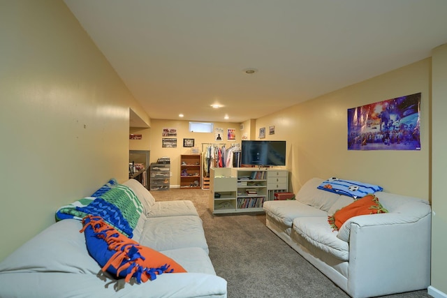 living area featuring recessed lighting and carpet floors