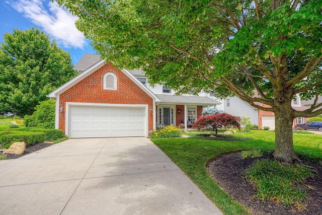 7317 Crosett Ct, Canal Winchester, OH 43110 - traditional-style house with brick siding, concrete driveway, an attached garage, and a front yard