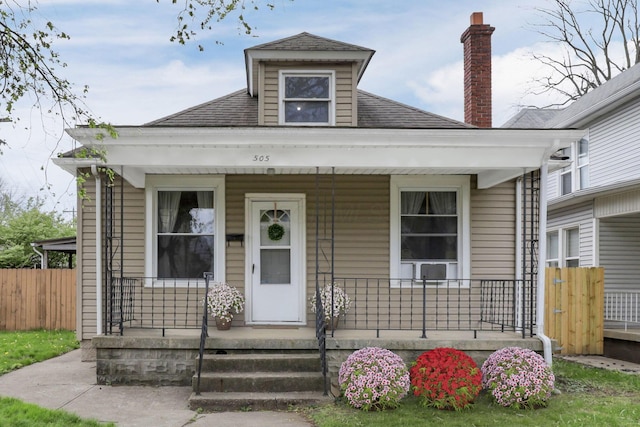 505 S Warren Ave, Columbus, OH 43204 - view of front facade featuring covered porch and roof with shingles