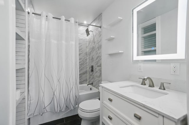 full bath featuring shower / tub combo, vanity, and toilet