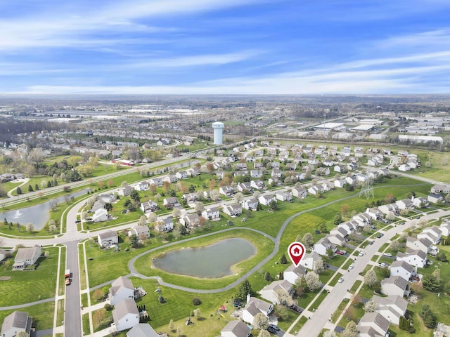 aerial view with a residential view and a water view