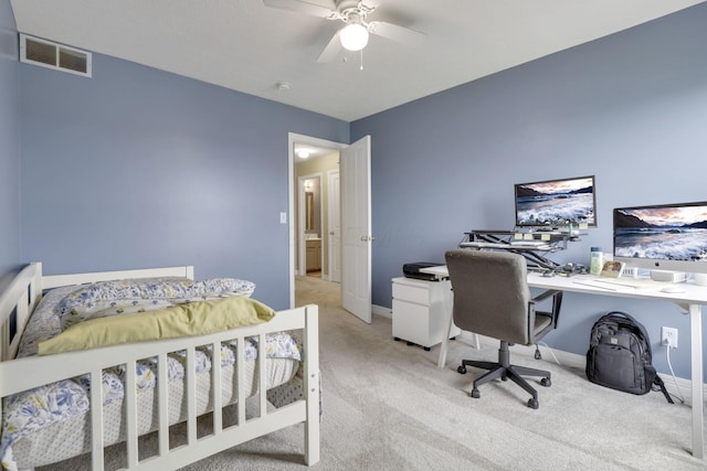 carpeted bedroom featuring visible vents, a ceiling fan, and baseboards
