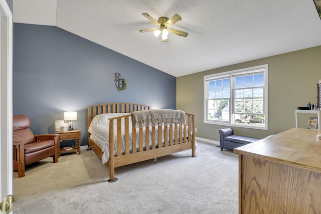 bedroom featuring vaulted ceiling, carpet floors, a ceiling fan, and baseboards