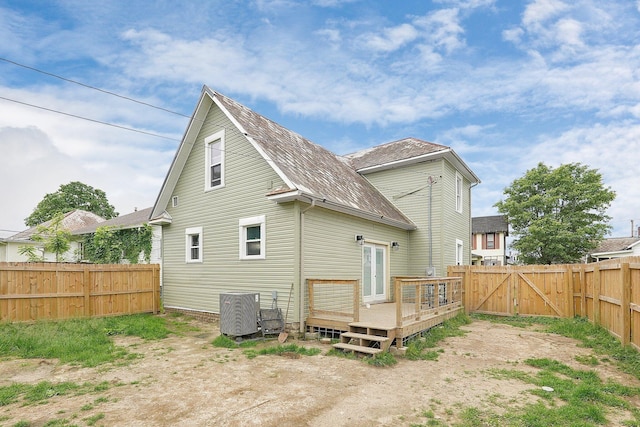 940 3rd St, Logan, OH 43138 - back of house with a fenced backyard, a gate, a wooden deck, and central AC unit